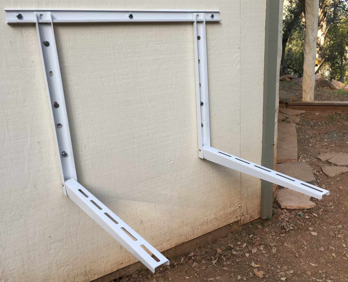 Compressor wall mounting bracket